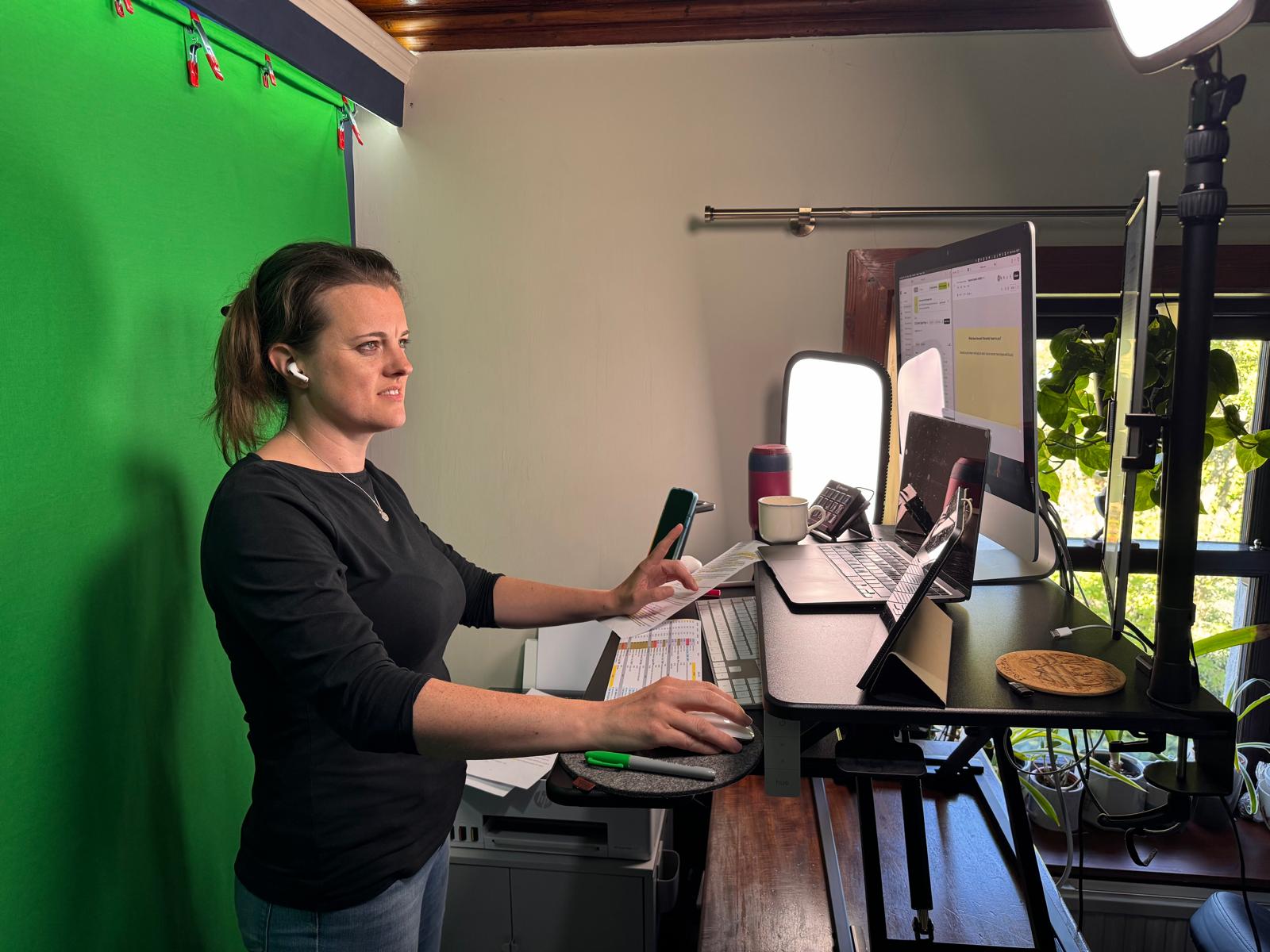 A conference contributor working behind the scenes